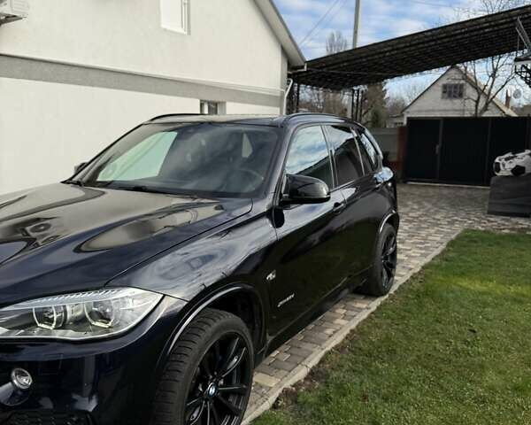 Синий БМВ Х5, объемом двигателя 2.99 л и пробегом 184 тыс. км за 27500 $, фото 2 на Automoto.ua