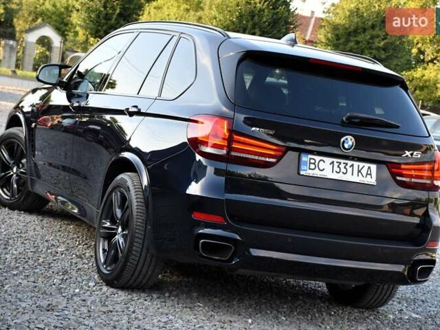 Синій БМВ Х5, об'ємом двигуна 2 л та пробігом 188 тис. км за 29900 $, фото 6 на Automoto.ua