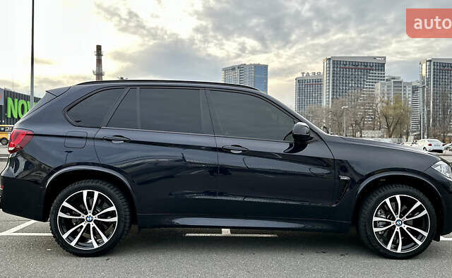 Синій БМВ Х5, об'ємом двигуна 4.4 л та пробігом 143 тис. км за 33999 $, фото 5 на Automoto.ua