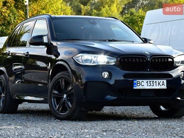 Синій БМВ Х5, об'ємом двигуна 2 л та пробігом 188 тис. км за 29900 $, фото 3 на Automoto.ua