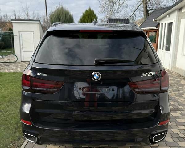 Синий БМВ Х5, объемом двигателя 2.99 л и пробегом 184 тыс. км за 27500 $, фото 4 на Automoto.ua