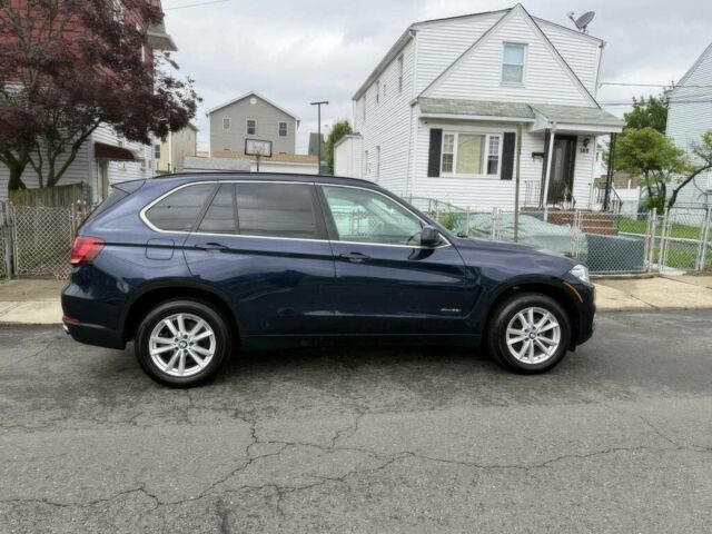 Синий БМВ Х5, объемом двигателя 3 л и пробегом 73 тыс. км за 12500 $, фото 5 на Automoto.ua