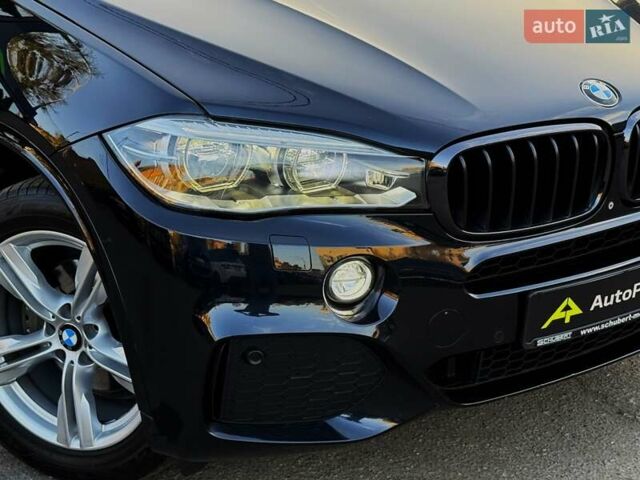 Синій БМВ Х5, об'ємом двигуна 2.99 л та пробігом 170 тис. км за 38499 $, фото 10 на Automoto.ua