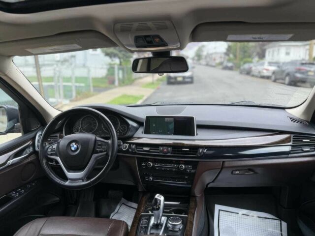 Синий БМВ Х5, объемом двигателя 3 л и пробегом 73 тыс. км за 12500 $, фото 6 на Automoto.ua