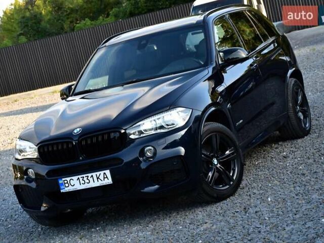 Синій БМВ Х5, об'ємом двигуна 2 л та пробігом 188 тис. км за 29900 $, фото 1 на Automoto.ua