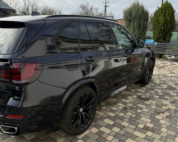 Синий БМВ Х5, объемом двигателя 2.99 л и пробегом 184 тыс. км за 27500 $, фото 3 на Automoto.ua