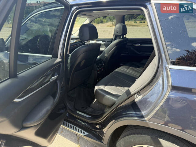 Синій БМВ Х5, об'ємом двигуна 2.99 л та пробігом 178 тис. км за 27000 $, фото 7 на Automoto.ua