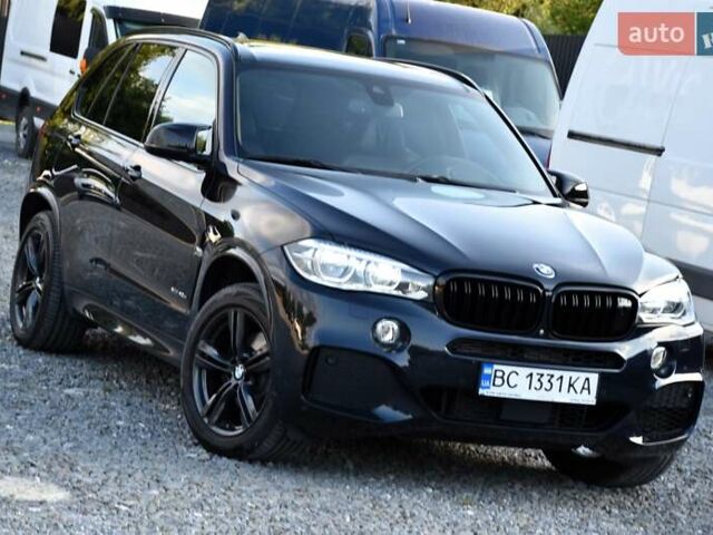Синій БМВ Х5, об'ємом двигуна 2 л та пробігом 188 тис. км за 29900 $, фото 4 на Automoto.ua
