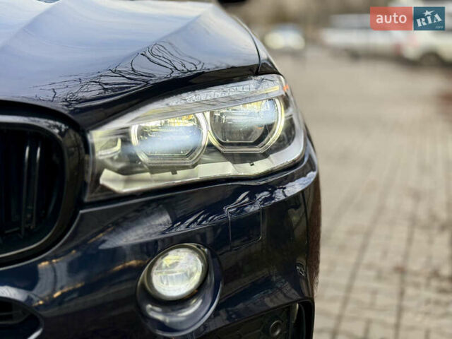 Синій БМВ Х5, об'ємом двигуна 2.99 л та пробігом 160 тис. км за 28500 $, фото 12 на Automoto.ua