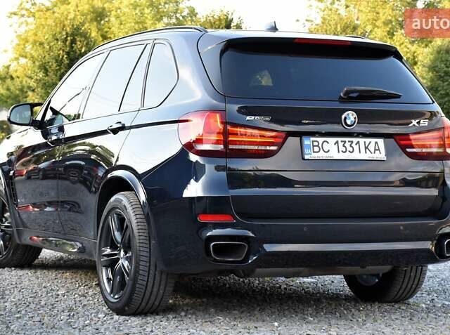 Синій БМВ Х5, об'ємом двигуна 2 л та пробігом 188 тис. км за 29900 $, фото 5 на Automoto.ua