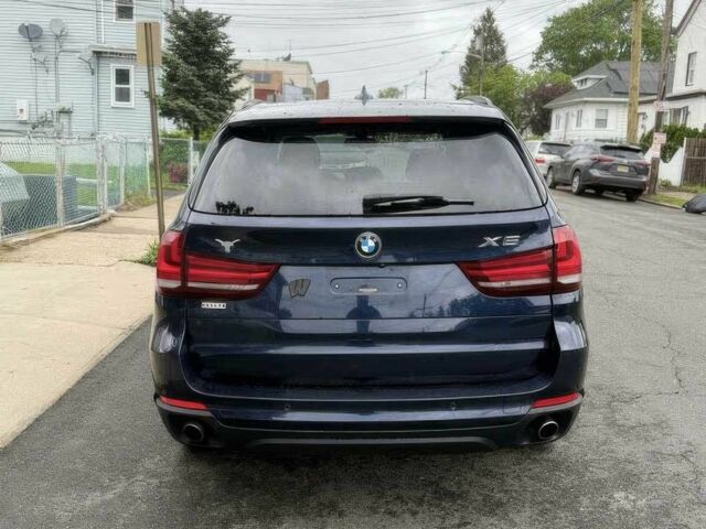 Синий БМВ Х5, объемом двигателя 3 л и пробегом 73 тыс. км за 12500 $, фото 4 на Automoto.ua