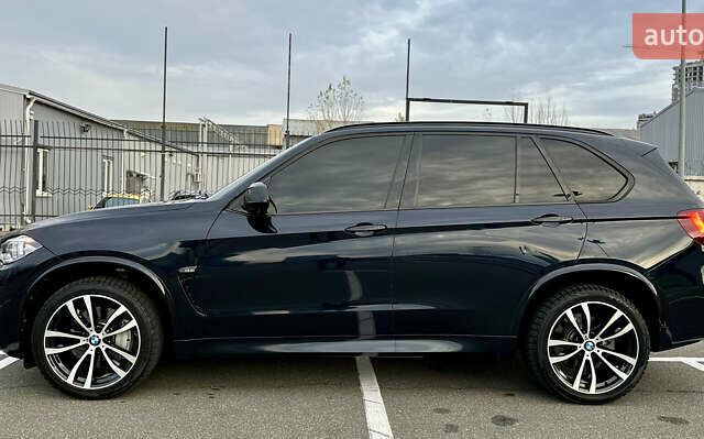 Синій БМВ Х5, об'ємом двигуна 4.4 л та пробігом 143 тис. км за 33999 $, фото 4 на Automoto.ua