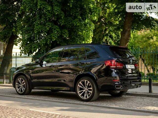 Синій БМВ Х5, об'ємом двигуна 2.99 л та пробігом 217 тис. км за 36500 $, фото 4 на Automoto.ua