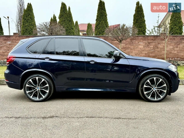 Синий БМВ Х5, объемом двигателя 3 л и пробегом 245 тыс. км за 29950 $, фото 7 на Automoto.ua