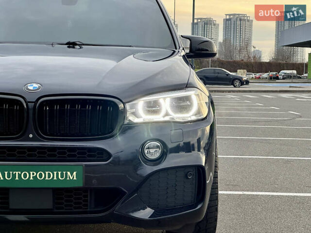 Синій БМВ Х5, об'ємом двигуна 4.4 л та пробігом 143 тис. км за 33999 $, фото 11 на Automoto.ua