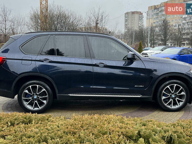 Синий БМВ Х5, объемом двигателя 2.99 л и пробегом 162 тыс. км за 28750 $, фото 7 на Automoto.ua