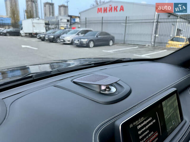 Синій БМВ Х5, об'ємом двигуна 4.4 л та пробігом 143 тис. км за 33999 $, фото 27 на Automoto.ua