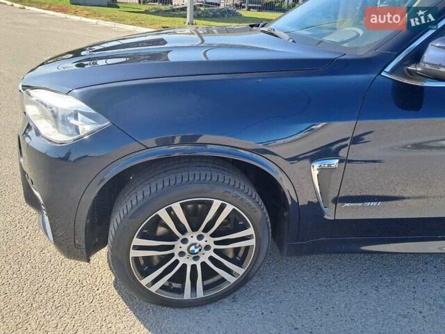 Синій БМВ Х5, об'ємом двигуна 2.98 л та пробігом 116 тис. км за 32000 $, фото 12 на Automoto.ua
