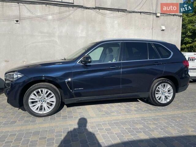 Синий БМВ Х5, объемом двигателя 2.99 л и пробегом 133 тыс. км за 26500 $, фото 3 на Automoto.ua