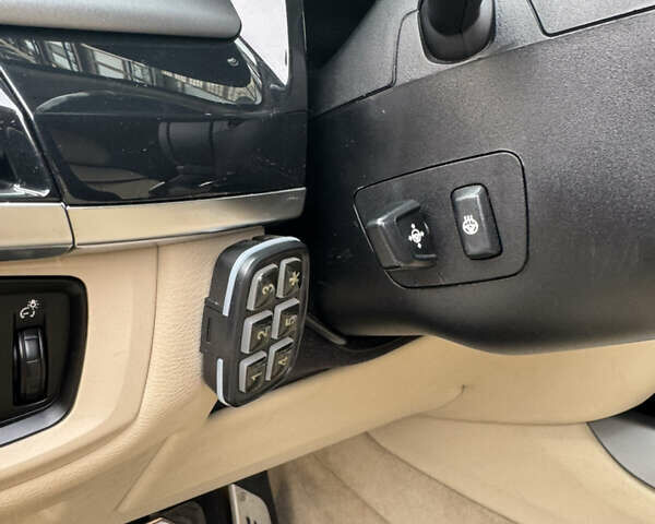 Синій БМВ Х5, об'ємом двигуна 2 л та пробігом 100 тис. км за 29999 $, фото 8 на Automoto.ua