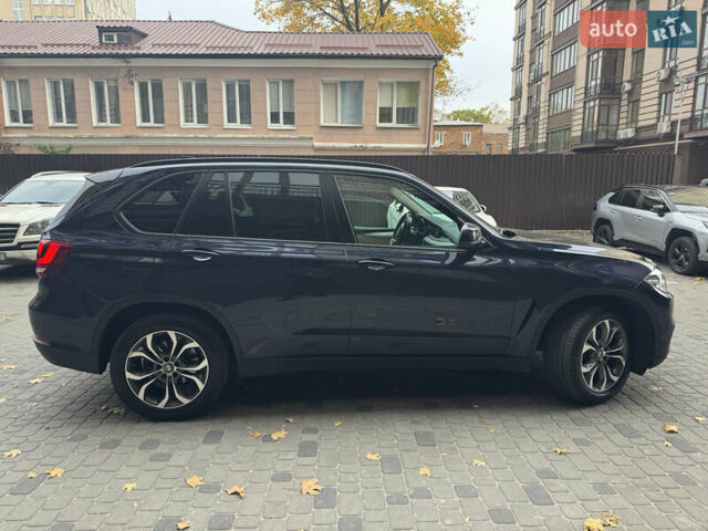 Синій БМВ Х5, об'ємом двигуна 2 л та пробігом 100 тис. км за 29999 $, фото 13 на Automoto.ua