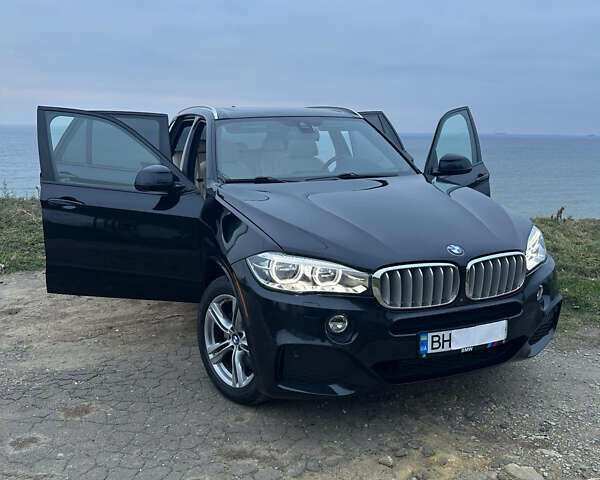 Синий БМВ Х5, объемом двигателя 2 л и пробегом 80 тыс. км за 35500 $, фото 2 на Automoto.ua