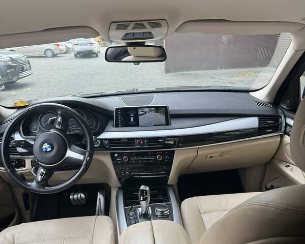 Синій БМВ Х5, об'ємом двигуна 2 л та пробігом 100 тис. км за 29999 $, фото 7 на Automoto.ua