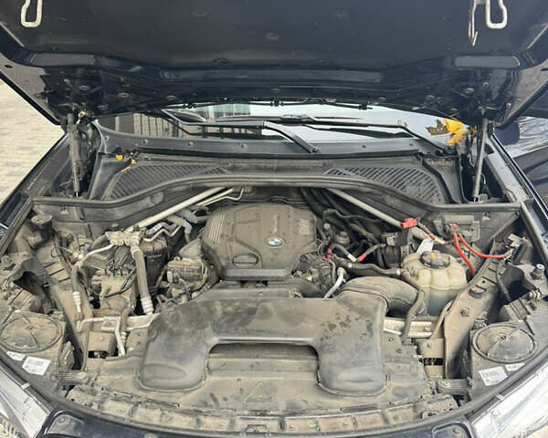 Синій БМВ Х5, об'ємом двигуна 2 л та пробігом 100 тис. км за 29999 $, фото 4 на Automoto.ua