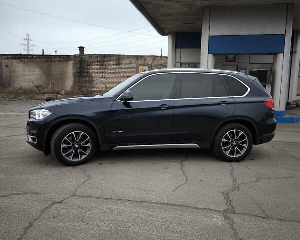 Синий БМВ Х5, объемом двигателя 2.98 л и пробегом 312 тыс. км за 20772 $, фото 3 на Automoto.ua