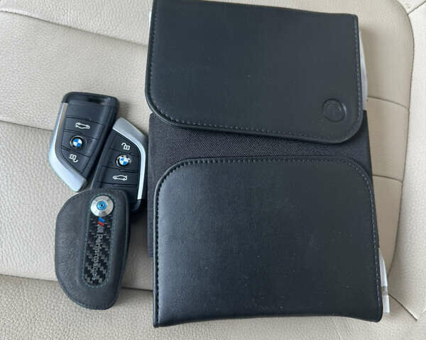 Синій БМВ Х5, об'ємом двигуна 2 л та пробігом 100 тис. км за 29999 $, фото 3 на Automoto.ua