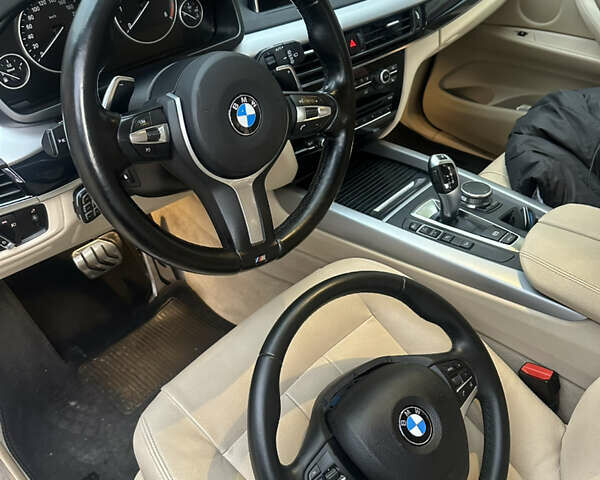 Синій БМВ Х5, об'ємом двигуна 2 л та пробігом 100 тис. км за 29999 $, фото 22 на Automoto.ua