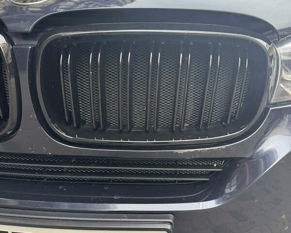Синій БМВ Х5, об'ємом двигуна 2 л та пробігом 100 тис. км за 29999 $, фото 9 на Automoto.ua