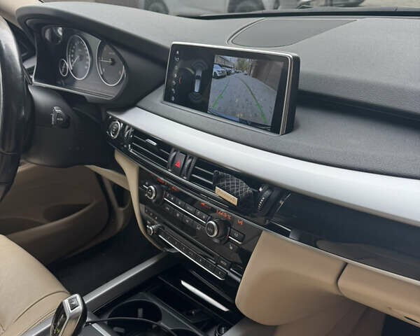 Синій БМВ Х5, об'ємом двигуна 2 л та пробігом 100 тис. км за 29999 $, фото 15 на Automoto.ua