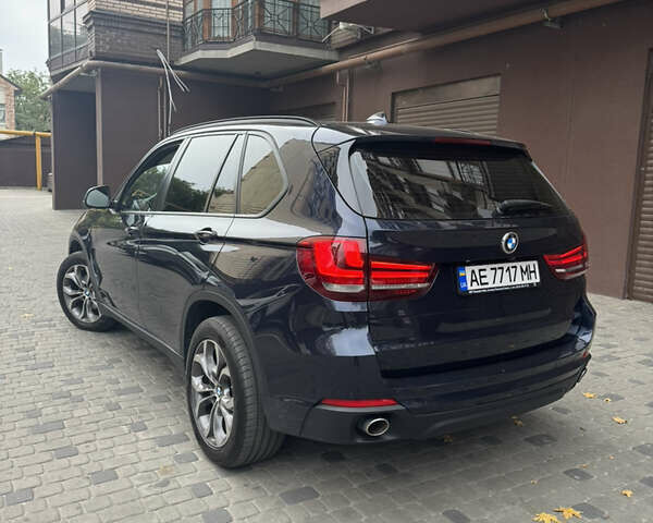 Синій БМВ Х5, об'ємом двигуна 2 л та пробігом 100 тис. км за 29999 $, фото 5 на Automoto.ua