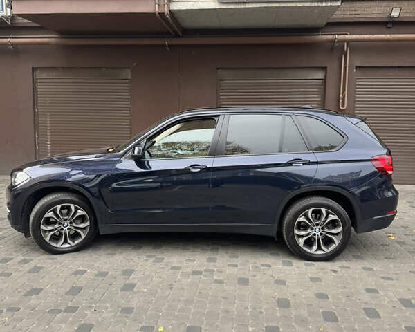 Синій БМВ Х5, об'ємом двигуна 2 л та пробігом 100 тис. км за 29999 $, фото 6 на Automoto.ua