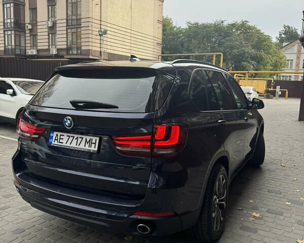 Синій БМВ Х5, об'ємом двигуна 2 л та пробігом 100 тис. км за 29999 $, фото 11 на Automoto.ua