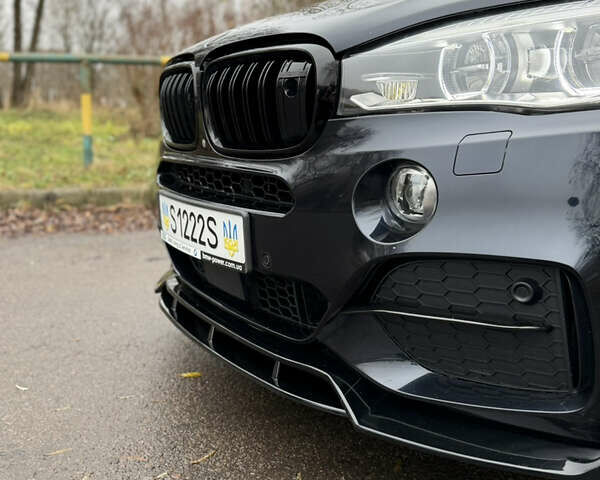 Синий БМВ Х5, объемом двигателя 3 л и пробегом 183 тыс. км за 41000 $, фото 9 на Automoto.ua