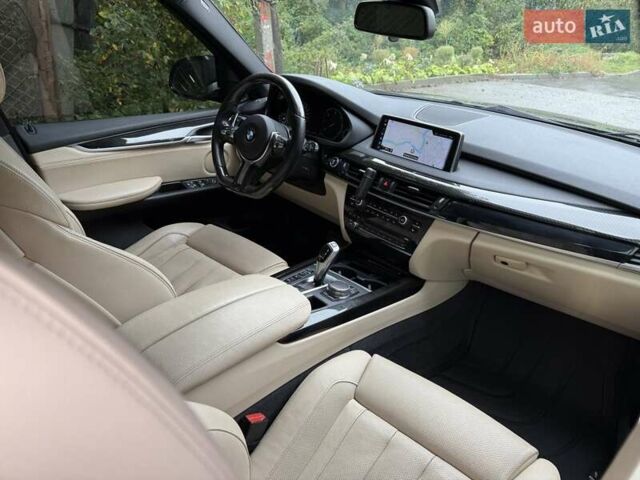 Синий БМВ Х5, объемом двигателя 3 л и пробегом 128 тыс. км за 37000 $, фото 7 на Automoto.ua