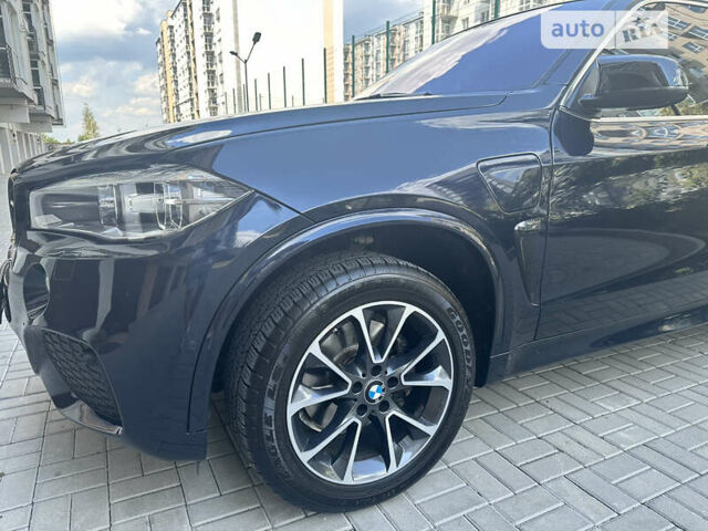 Синий БМВ Х5, объемом двигателя 2 л и пробегом 145 тыс. км за 30000 $, фото 3 на Automoto.ua