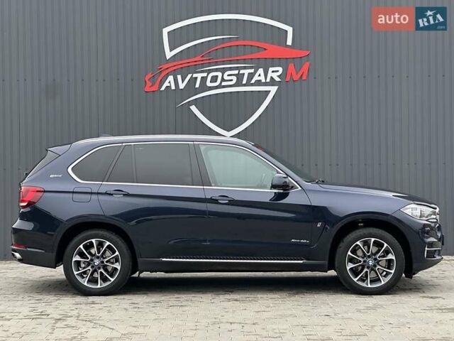 Синий БМВ Х5, объемом двигателя 2 л и пробегом 151 тыс. км за 32900 $, фото 2 на Automoto.ua