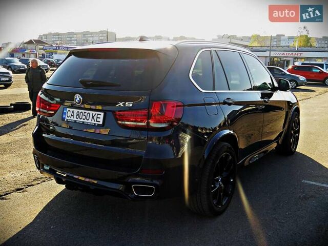 Синій БМВ Х5, об'ємом двигуна 3 л та пробігом 133 тис. км за 29950 $, фото 2 на Automoto.ua
