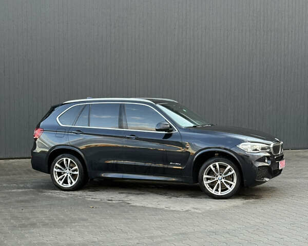 Синий БМВ Х5, объемом двигателя 3 л и пробегом 222 тыс. км за 33500 $, фото 1 на Automoto.ua