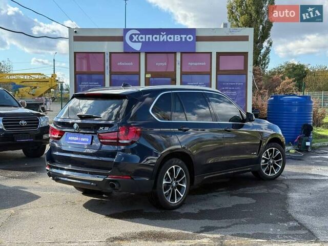 Синий БМВ Х5, объемом двигателя 2.98 л и пробегом 150 тыс. км за 25500 $, фото 4 на Automoto.ua
