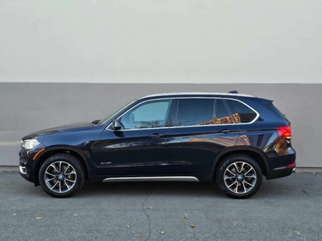 Синий БМВ Х5, объемом двигателя 3 л и пробегом 104 тыс. км за 9650 $, фото 2 на Automoto.ua