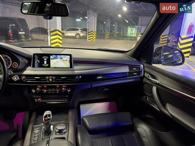 Синий БМВ Х5, объемом двигателя 2 л и пробегом 120 тыс. км за 36500 $, фото 30 на Automoto.ua