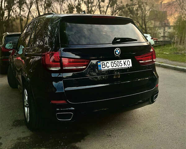 Синій БМВ Х5, об'ємом двигуна 2.99 л та пробігом 210 тис. км за 40000 $, фото 4 на Automoto.ua