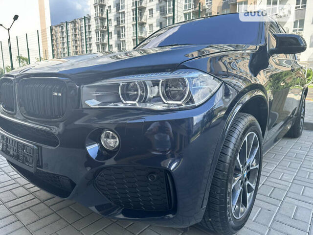 Синий БМВ Х5, объемом двигателя 2 л и пробегом 145 тыс. км за 30000 $, фото 4 на Automoto.ua