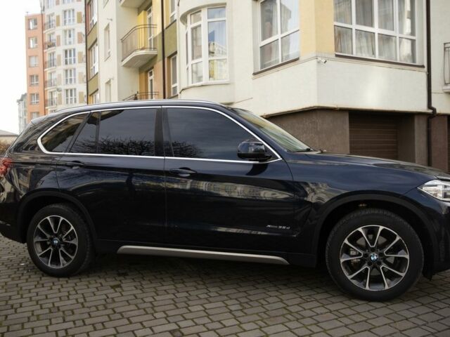 Синий БМВ Х5, объемом двигателя 3 л и пробегом 116 тыс. км за 34000 $, фото 3 на Automoto.ua