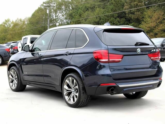 Синий БМВ Х5, объемом двигателя 3 л и пробегом 58 тыс. км за 17300 $, фото 6 на Automoto.ua