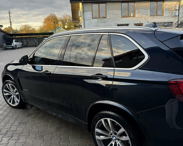 Синий БМВ Х5, объемом двигателя 3 л и пробегом 222 тыс. км за 33500 $, фото 7 на Automoto.ua